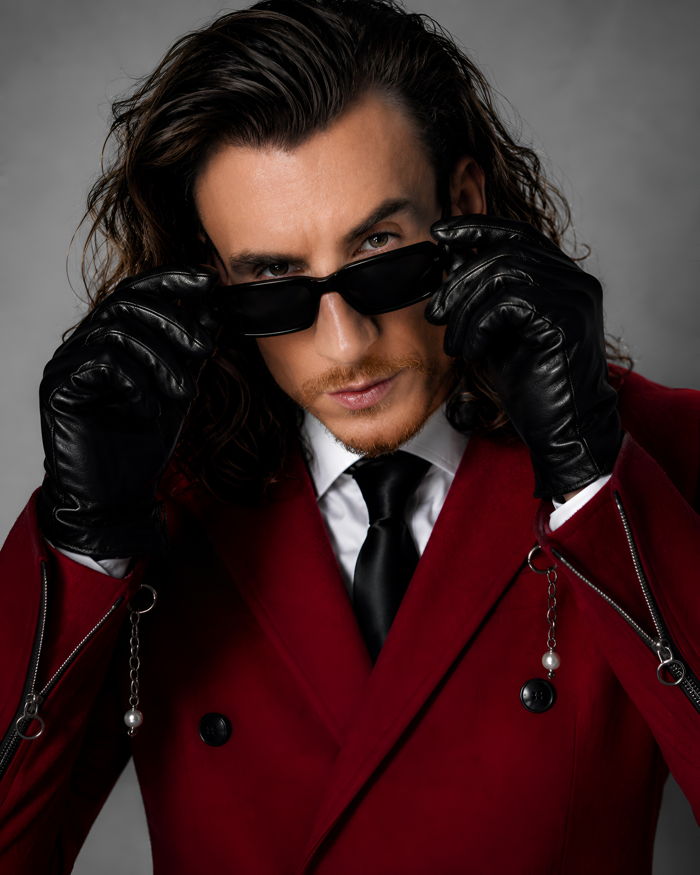 Adi Gheo commercial character portrait in a red suit and black gloves