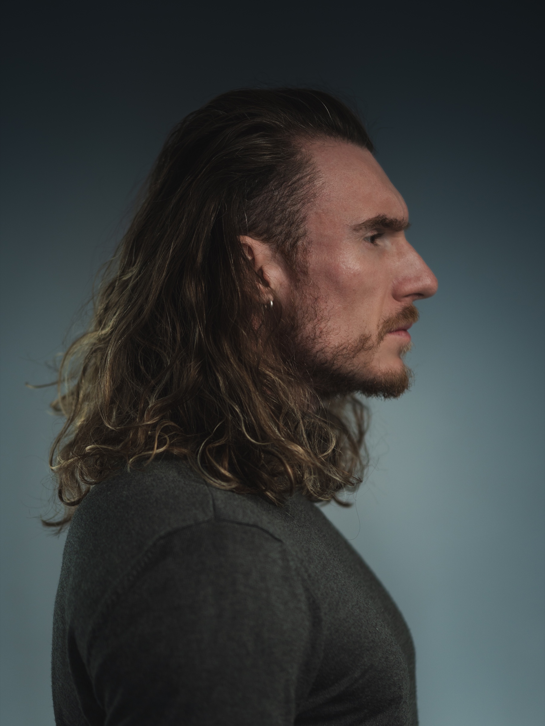 Adi Gheo Romanian actor right profile with long hair
